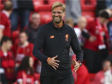 Trainer Jürgen Klopp freut sich über den Einzug in die Gruppenphase der Champions League.