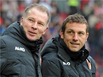 Trainer Markus Weinzierl und Manager Stefan Reuter haben langfristig beim FC Augsburg verlängert. Foto: Stefan Puchner