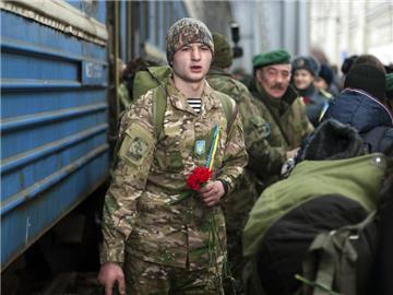 Ukrainische Soldaten kehren von der Front heim nach Lwiw. Foto: Ivan Boberskyy
