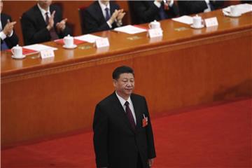 Unter Xi Jinping beginnt eine „neue Ära“ für China. Kein Führer seit Staatsgründer Mao Tsetung hatte soviel Macht in den Händen wie der heutige Präsident. Foto: Andy Wong/AP