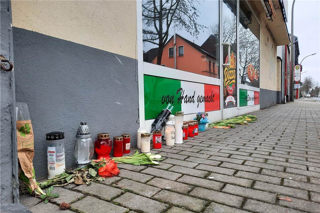 Tod bestätigt: Pizzabäcker aus der Pizzeria „Asal“ wird heute beerdigt Blumen und Kerzen vor der Pizzeria "Asal" an der Lütgendortmunder Straße
