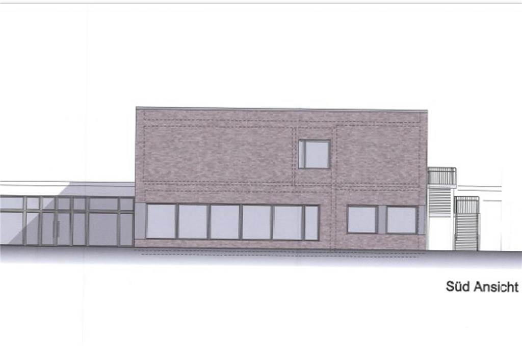 Blick vom Schulhof auf die neue Aula.