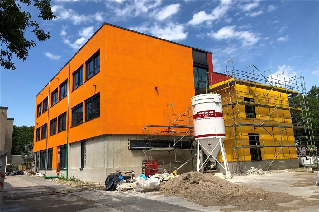 Awo Brackel packt Kisten - dabei ist neuer Standort noch nicht fertig Von außen wirkt der Neubau schon recht weit fortgeschritten. Am Innenleben hapert's allerdings noch