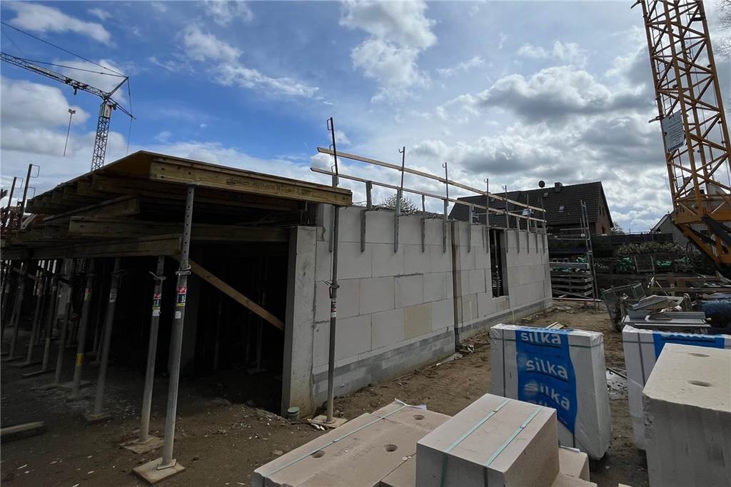 Neue Eigentumswohnungen kurz vor Vollendung: Das bieten und kosten sie Blick auf den Rohbau eines Mehrfamilienhauses am Dietrich-Bonhoeffer-Weg in Herten.