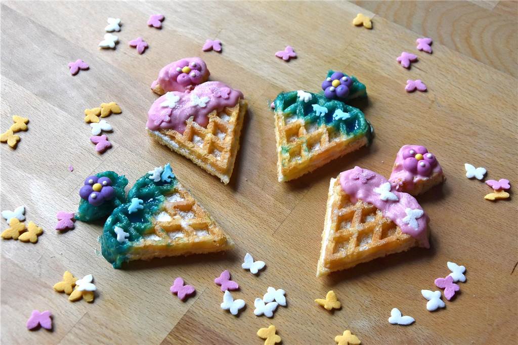 So wird die Kaffeetafel zur Einschulung ein Hingucker: Unkomplizierte Ideen Waffeln lassen sich schnell in kleine Schultüten verwandeln.