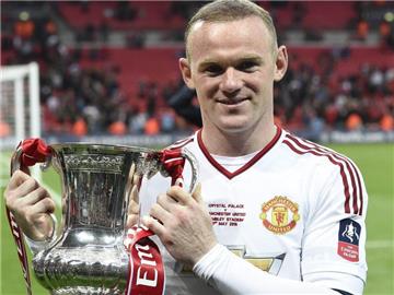 Wayne Rooney ist bei Manchester United glücklich. Foto: Facundo Arrizabalaga