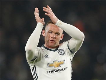 Wayne Rooney wird weiterhin für Manchester United spielen. Foto: Martin Rickett