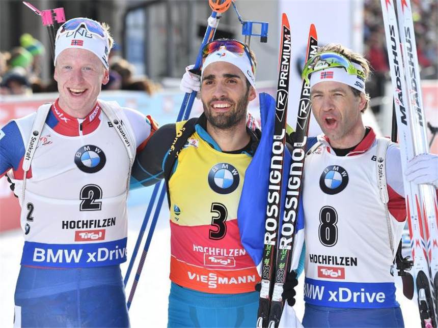 Biathlon-Verfolgung: Schempp weiter ohne WM-Medaille Weltmeister Martin Fourcade (M), Johannes Thingnes Bö (l, Silber) und Ole Einar Björndalen (Bronze). Foto: Martin Schutt