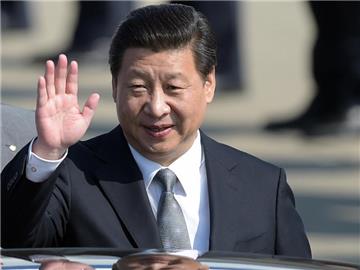 Xi Jinping in Düsseldorf: Der Personenkult um Chinas neuen Staats- und Parteichef in Staatsmedien ähnelt dem um Mao Tsetung. Foto: Federico Gambarini/Archiv